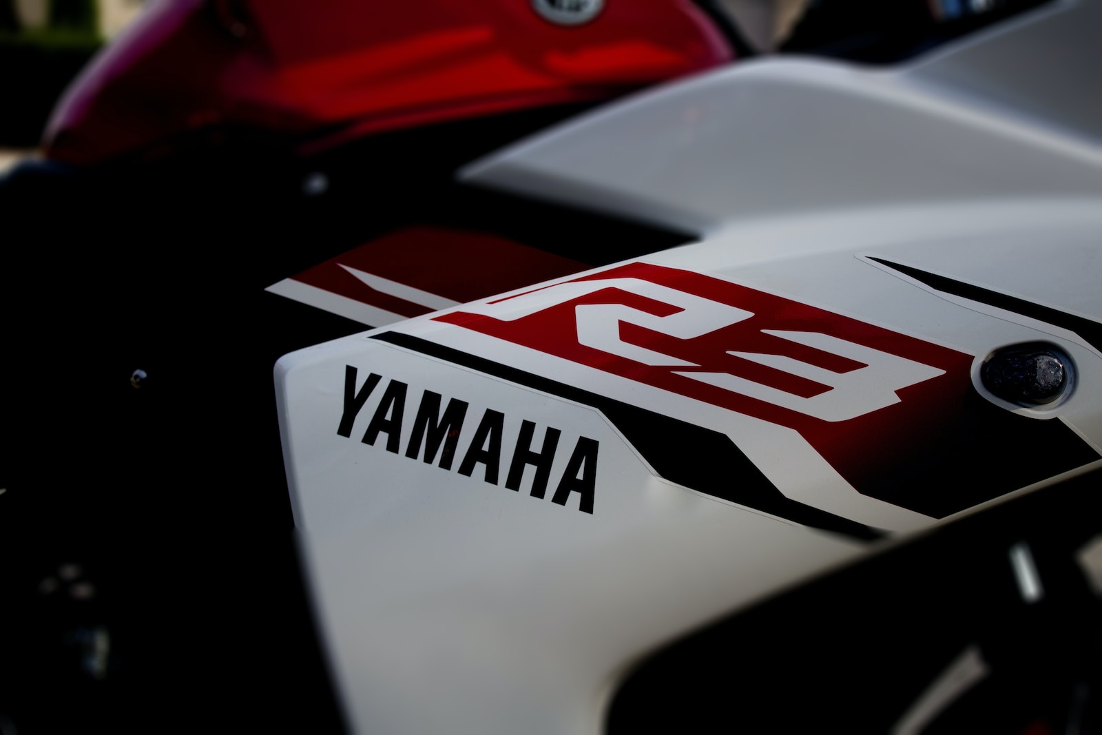 white Yamaha R3 motorcycle