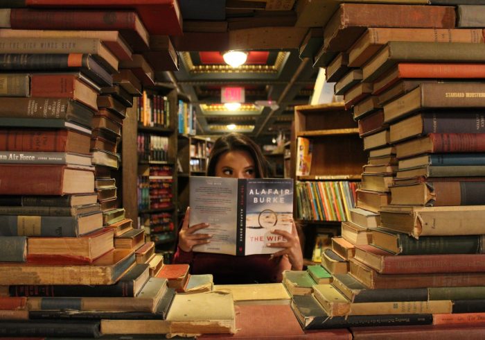 woman holding book